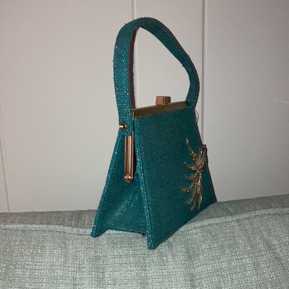 Moo Roo designer teal shimmer peacock vintage purse
Perfect compliment to Easter - Picture 6 of 7